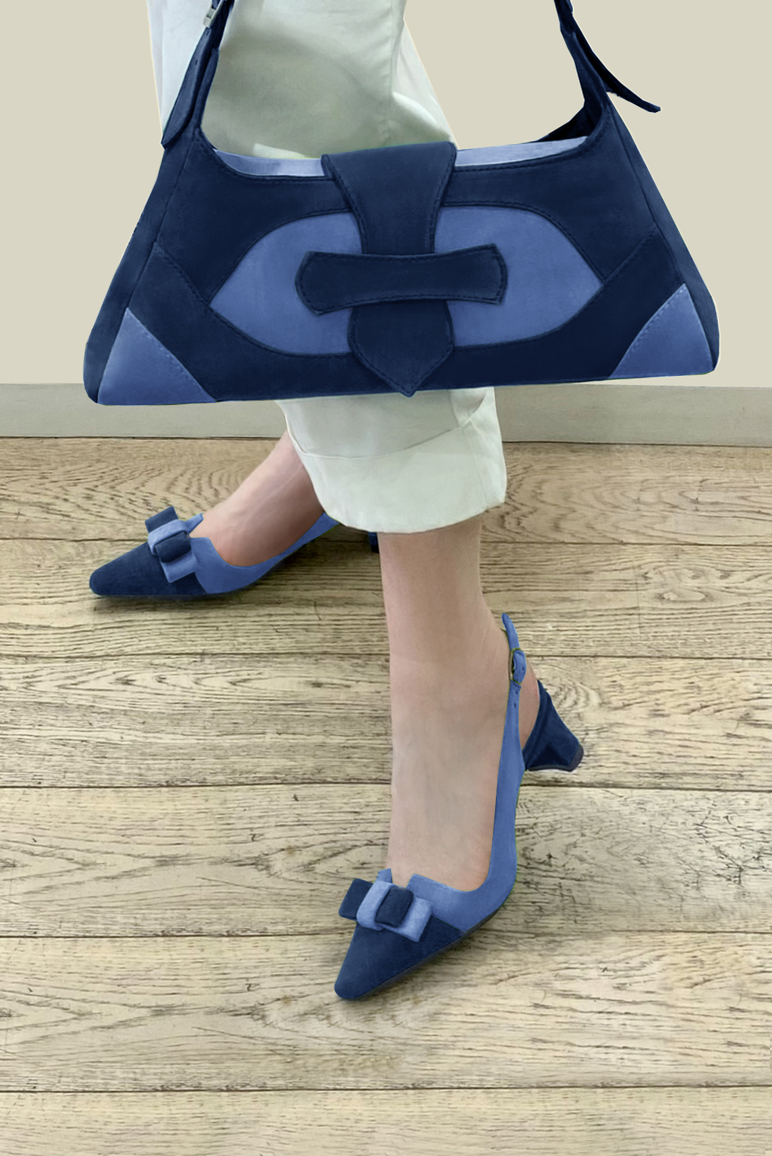 Navy blue women's dress handbag, matching pumps and belts. Worn view - Florence KOOIJMAN